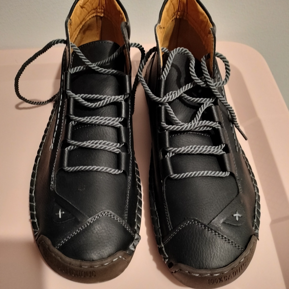 Blue and Black Boat Shoes with Unique Stitching and Lace-Up Design
